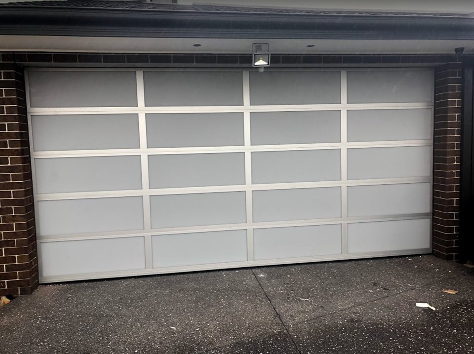 Clearlite garage door with silver frame